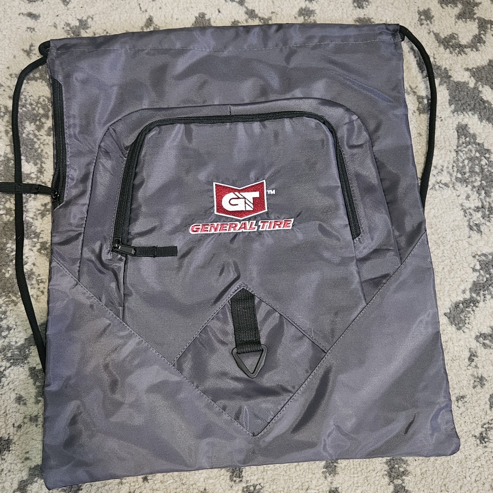 General Tire Grey Draw String Backpack with Multiple Pockets and Logo